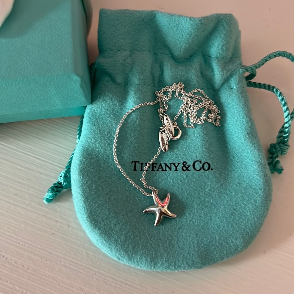 Tiffany &Co. starfish pendant.  Sterling silver